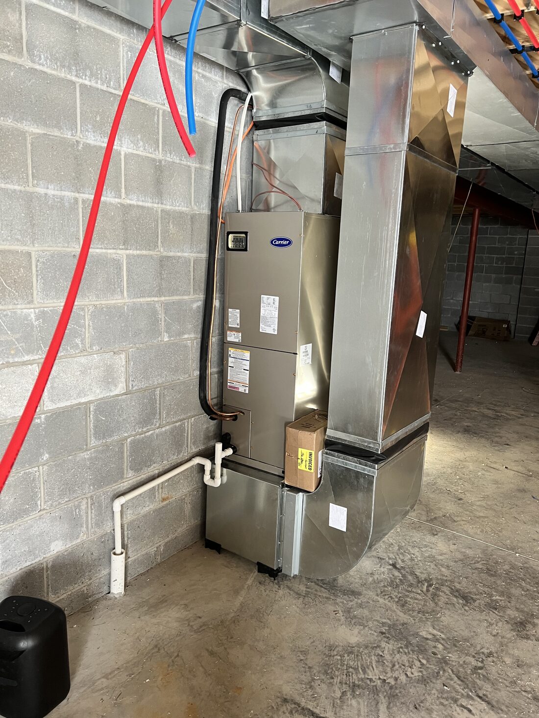 Air handler and new ductwork installed in a basement